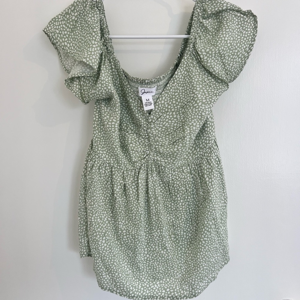 Green peplum top